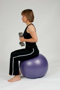 stability ball tricep extension • step 1